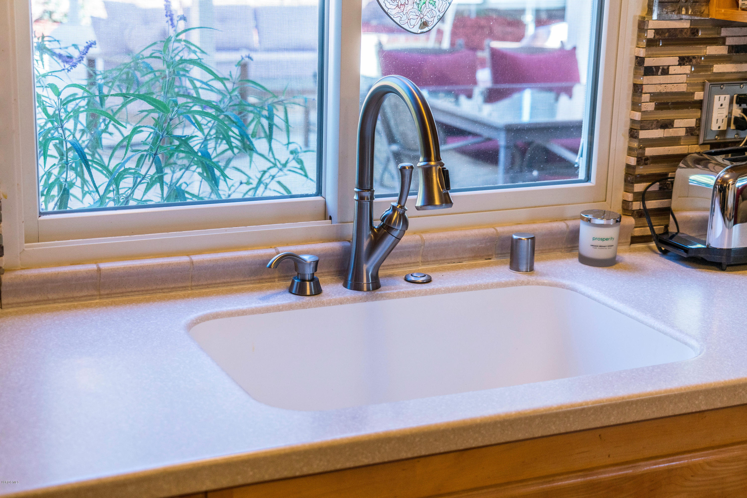 2849 Fitzgerald Road Simi Valley, CA 93065 - Photo 8 of 25 a bathroom with a sink and a large mirror