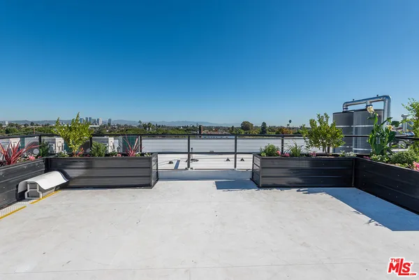 a view of a terrace with outdoor seating