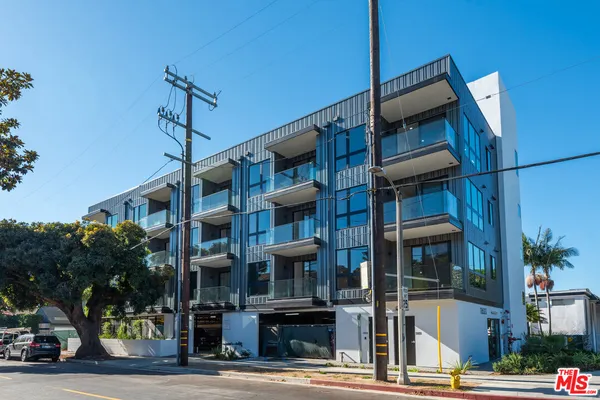 a front view of a building with street view