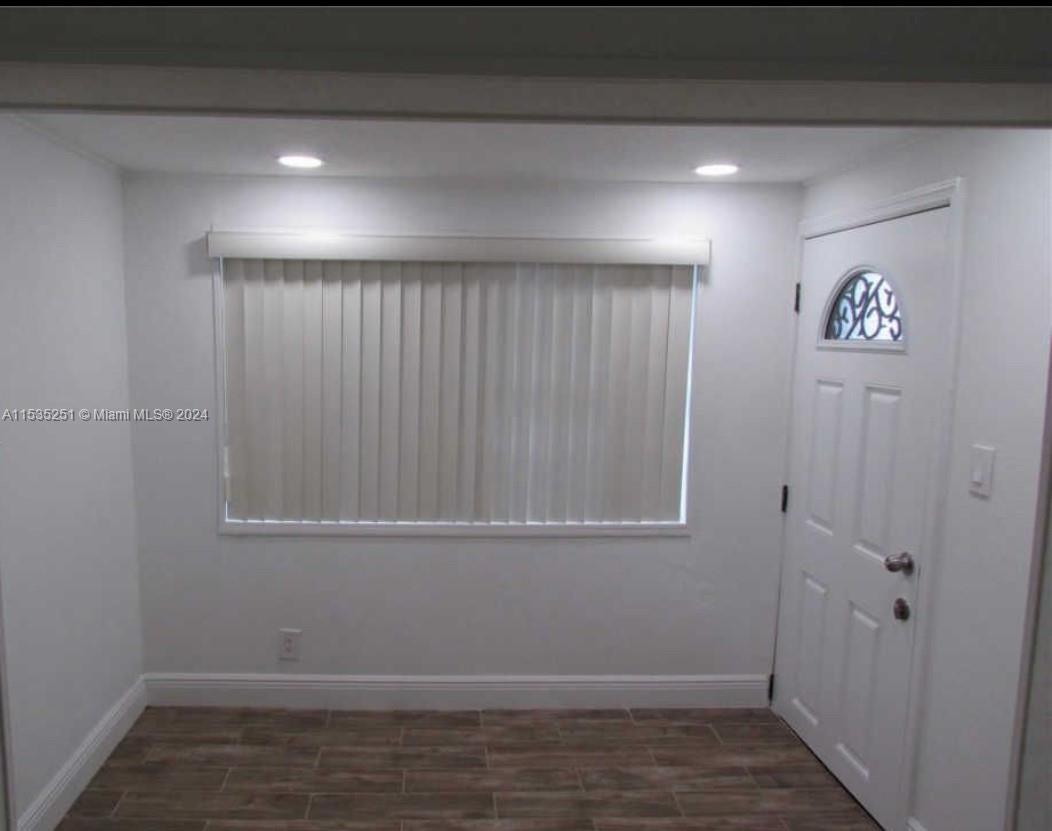 6111 Southwest 39th Street Miramar, FL 33023 - Photo 2 of 8 a view of an empty room