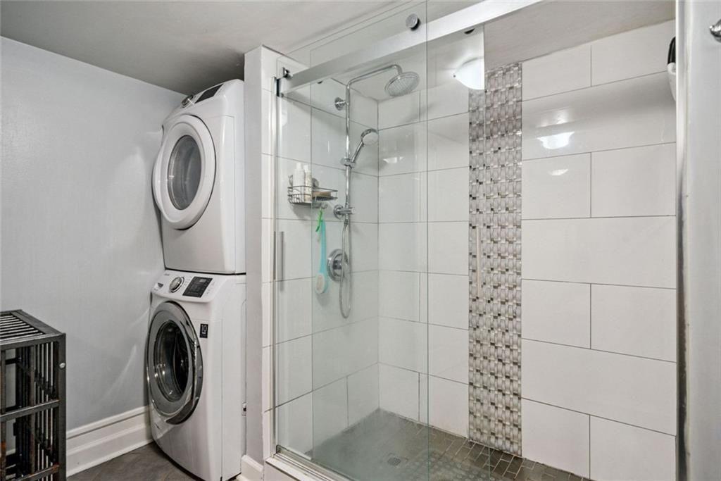 3048 Briarcliff Road Northeast, Unit 9 Atlanta, GA 30329 - Photo 21 of 30 a bathroom with a sink a toilet and shower