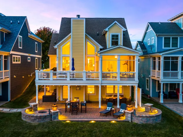 a view of swimming pool with outdoor seating and a yard