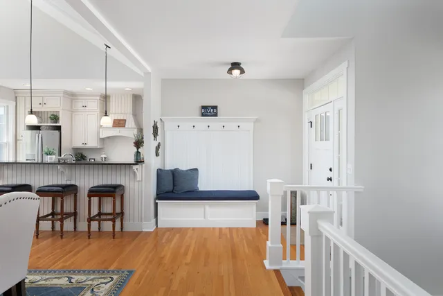 a living room with furniture and a table