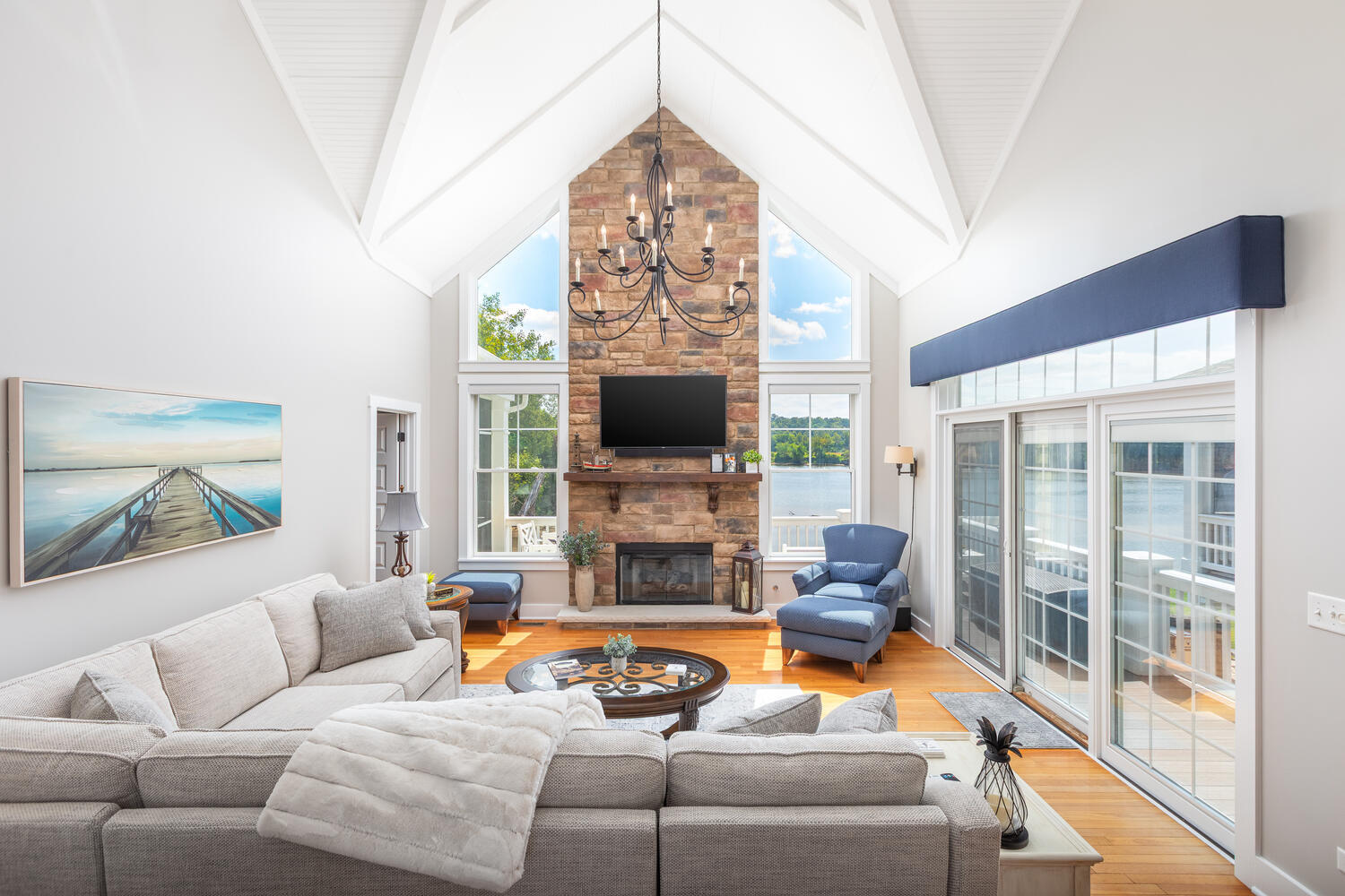 5 Windward Way Ottawa, IL 61350 - Photo 24 of 50 a living room with furniture a flat screen tv and a fireplace