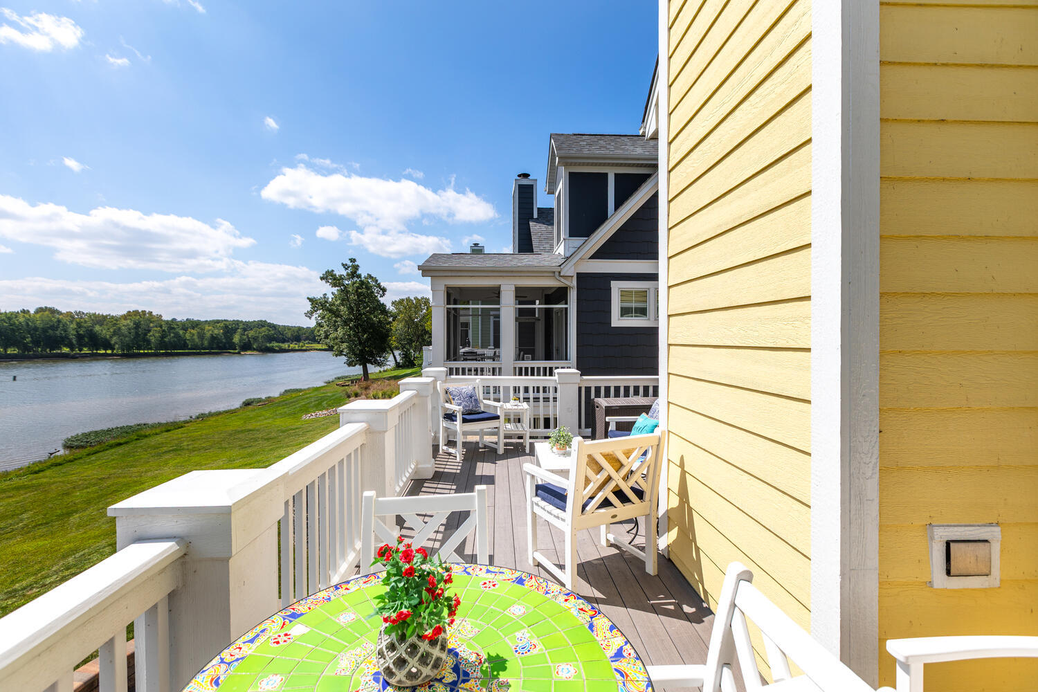 5 Windward Way Ottawa, IL 61350 - Photo 34 of 50 a view of a house with lake and a garden