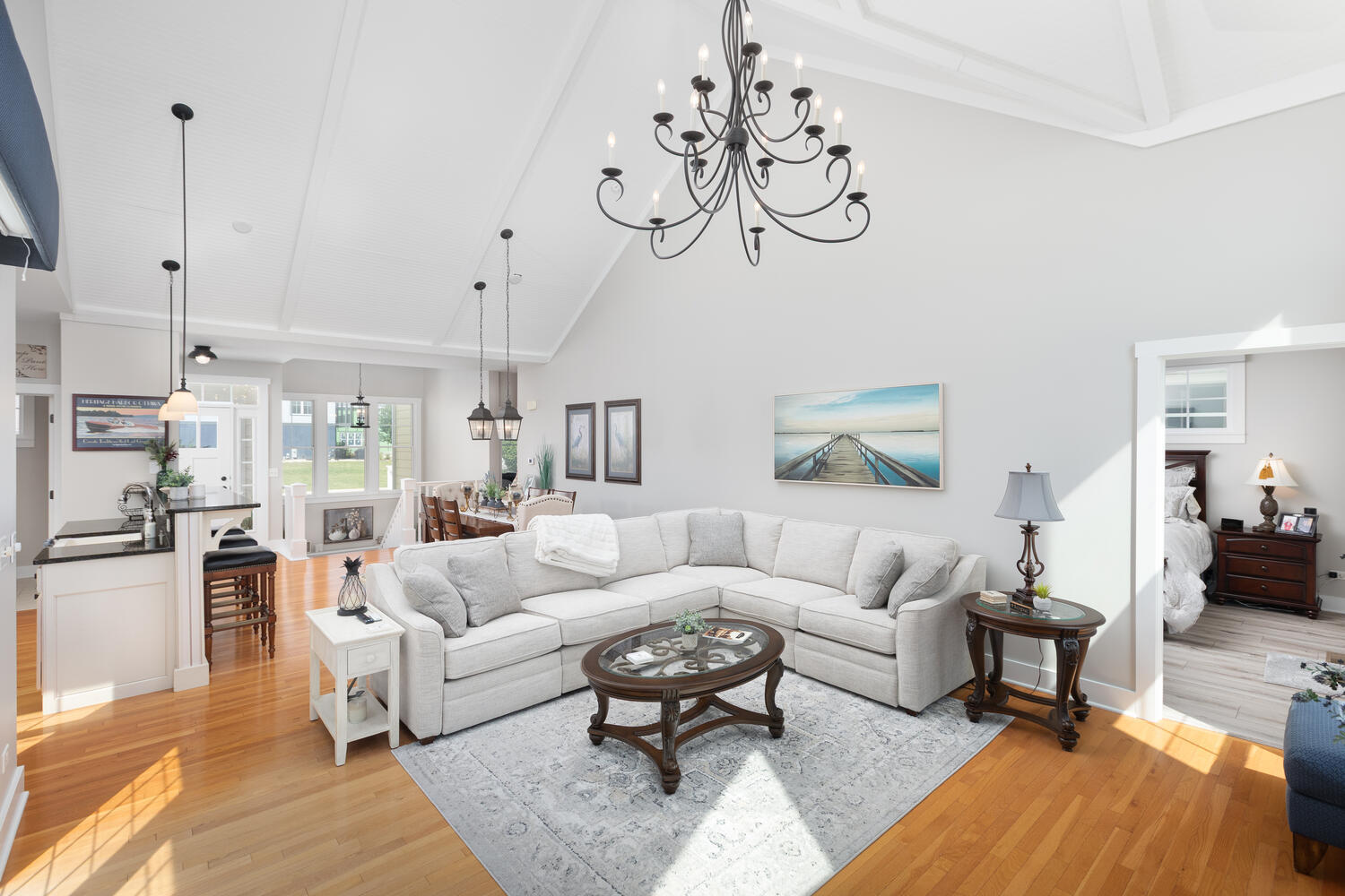 5 Windward Way Ottawa, IL 61350 - Photo 38 of 50 a living room with furniture a chandelier and a rug