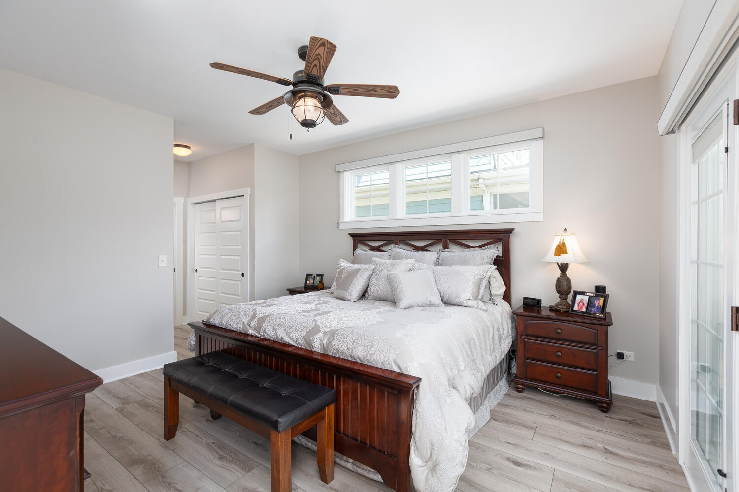 5 Windward Way Ottawa, IL 61350 - Photo 40 of 50 a bedroom with a bed and a chandelier