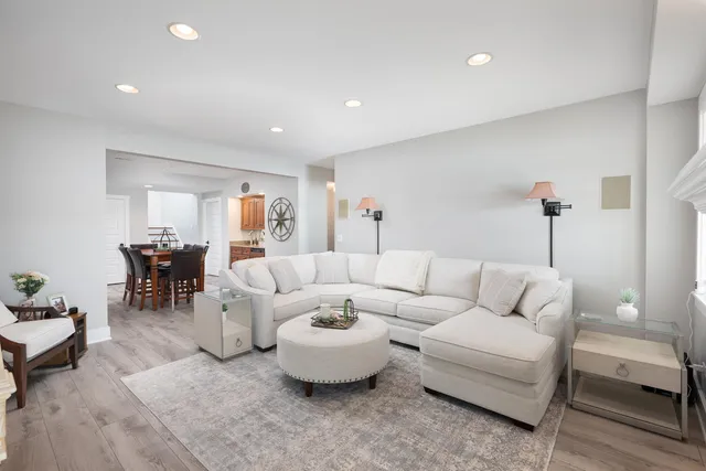 a living room with furniture and a table