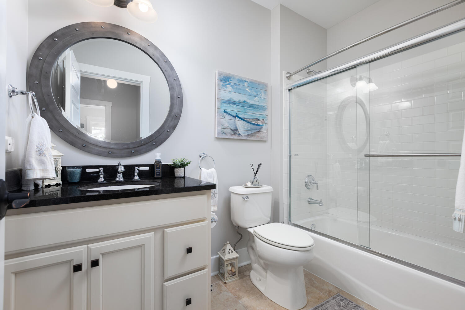 5 Windward Way Ottawa, IL 61350 - Photo 49 of 50 a bathroom with a toilet a sink and a mirror