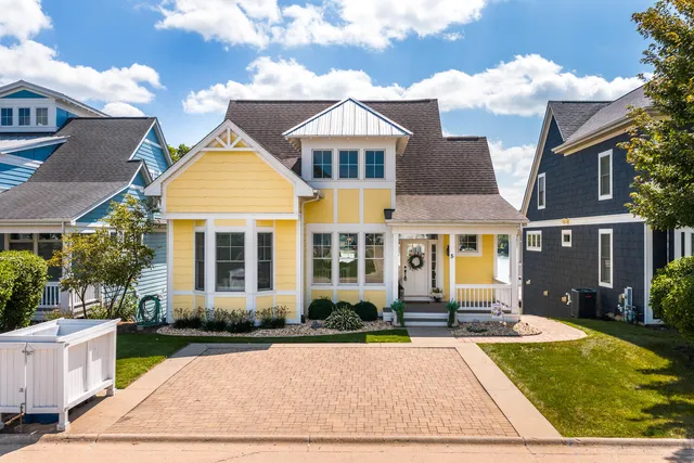 front view of a house with a yard