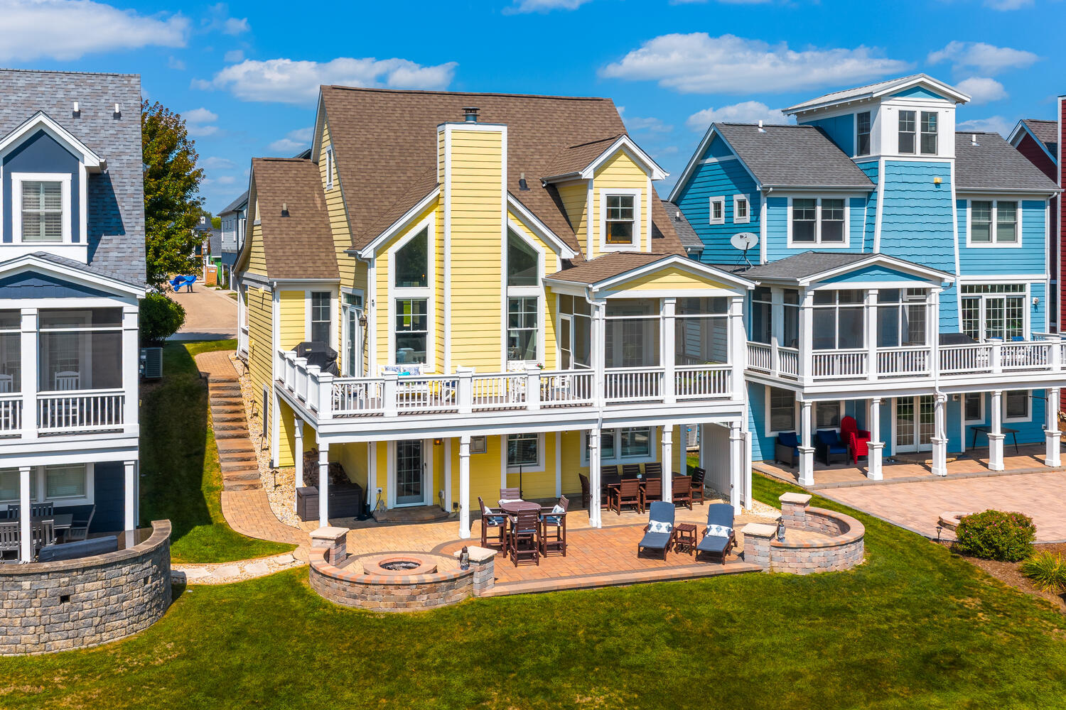 5 Windward Way Ottawa, IL 61350 - Photo 9 of 50 a front view of a building with a yard table and chairs