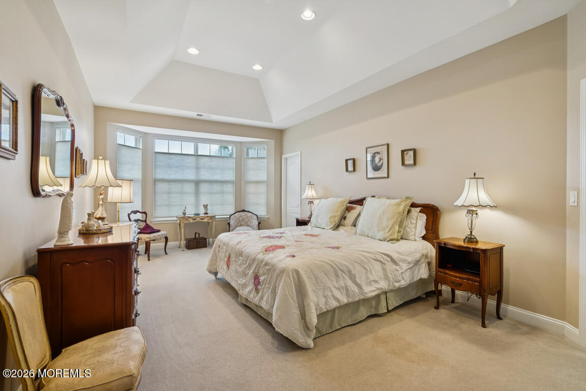 101 Nottingham Way Jackson, NJ 08527 - Photo 13 of 31 a spacious bedroom with a bed and a large window
