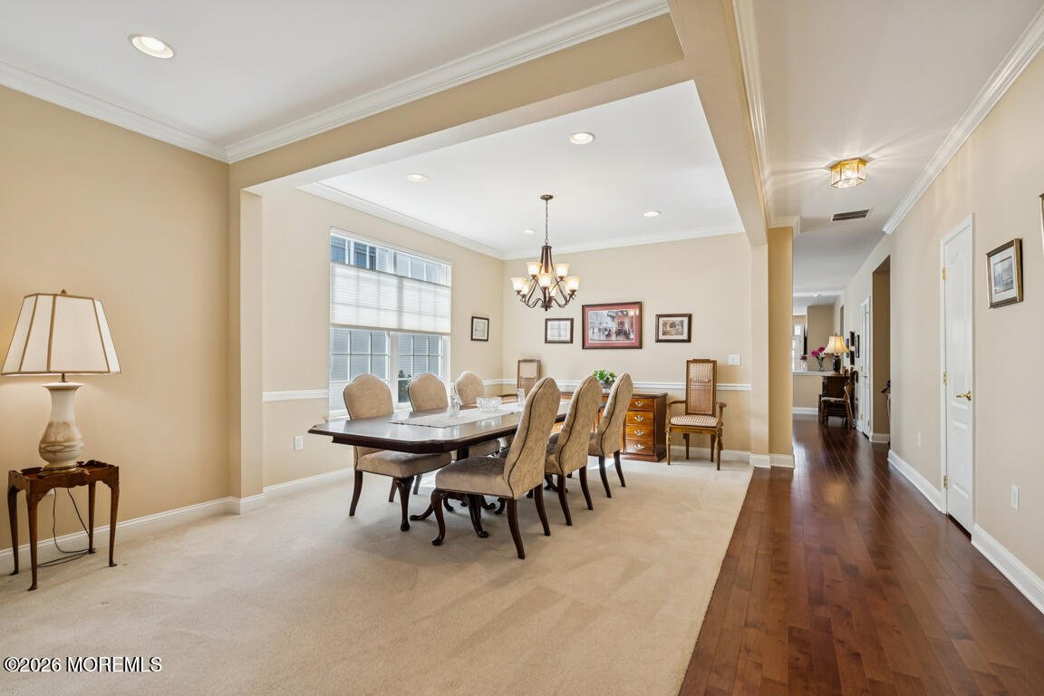 101 Nottingham Way Jackson, NJ 08527 - Photo 3 of 31 a dining room with furniture and window