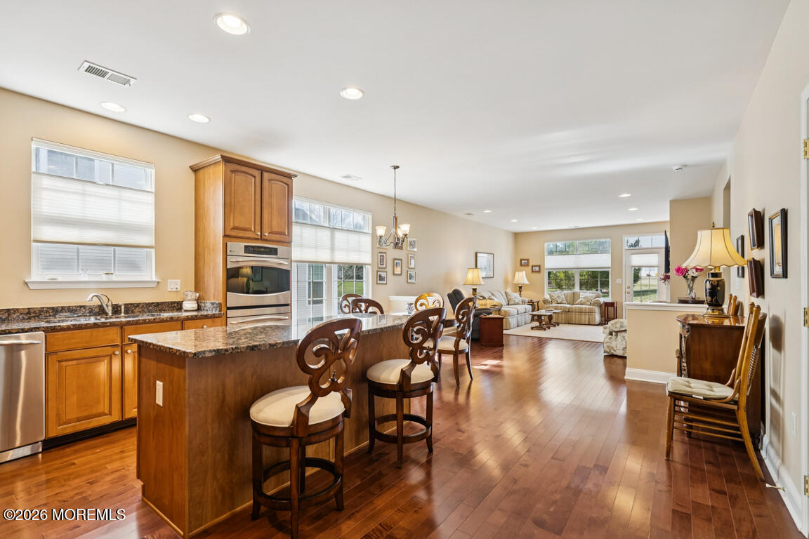 101 Nottingham Way Jackson, NJ 08527 - Photo 5 of 31 a very nice looking living room with kitchen island furniture and a large window
