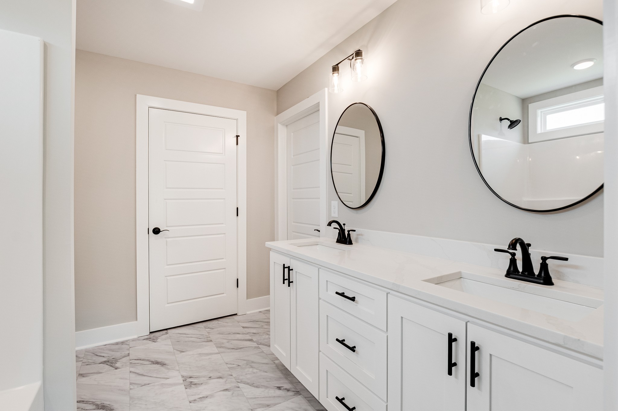 916 Butler Bridge Road Portland, TN 37148 - Photo 18 of 26 a bathroom with a double vanity sink and a mirror