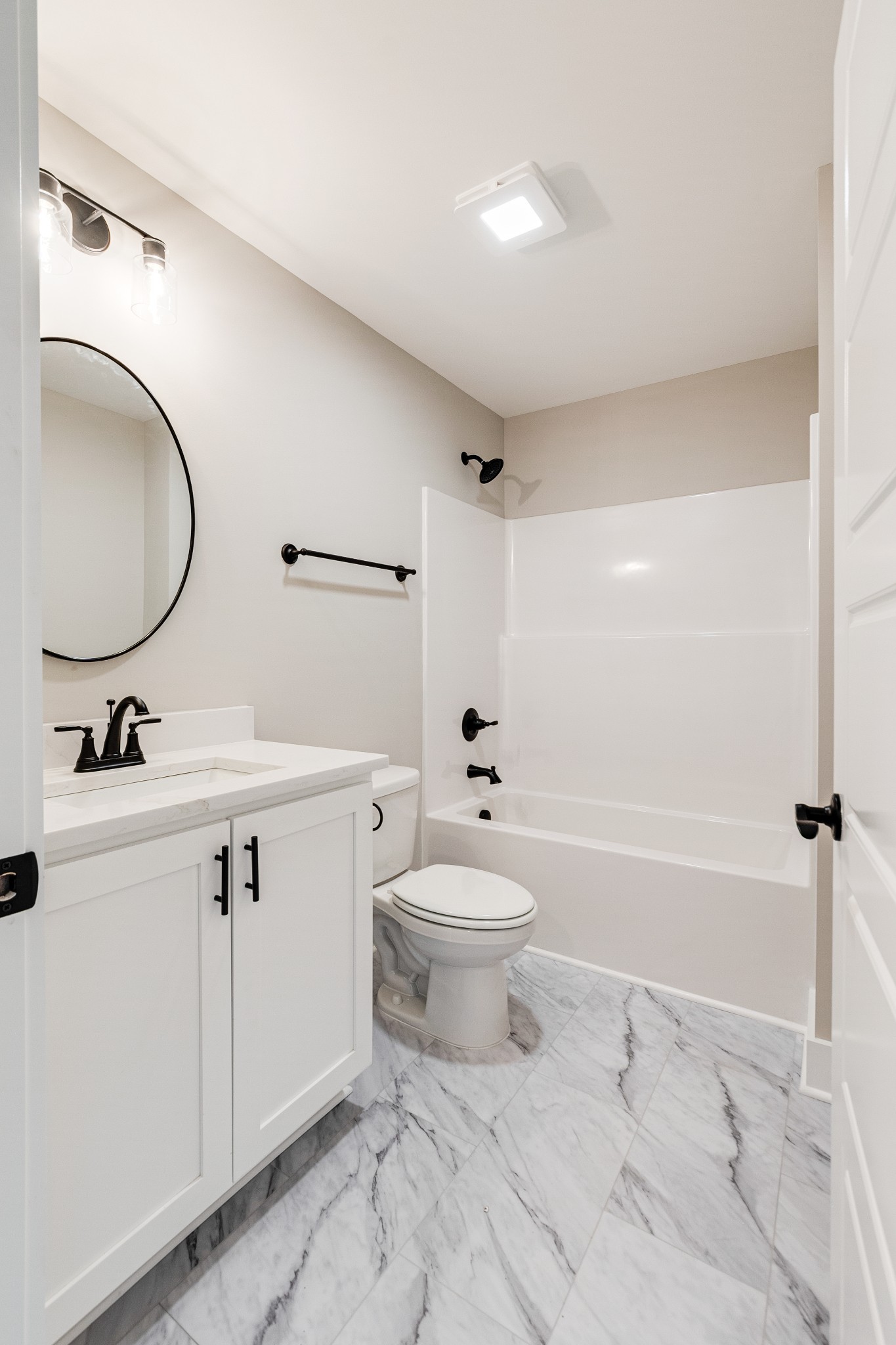 916 Butler Bridge Road Portland, TN 37148 - Photo 24 of 26 a bathroom with a sink toilet and shower