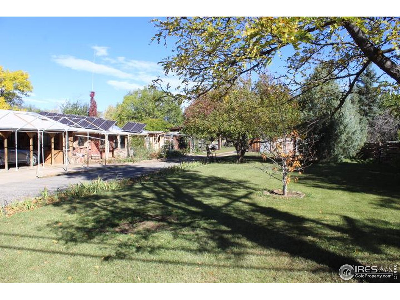 6137 Baseline Road Boulder, CO 80303 - Photo 24 of 40 a view of a house with a yard