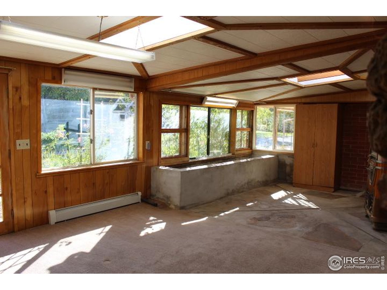6137 Baseline Road Boulder, CO 80303 - Photo 7 of 40 a living room with a large window