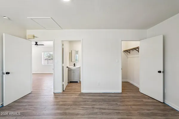 a kitchen with a sink stove and refrigerator