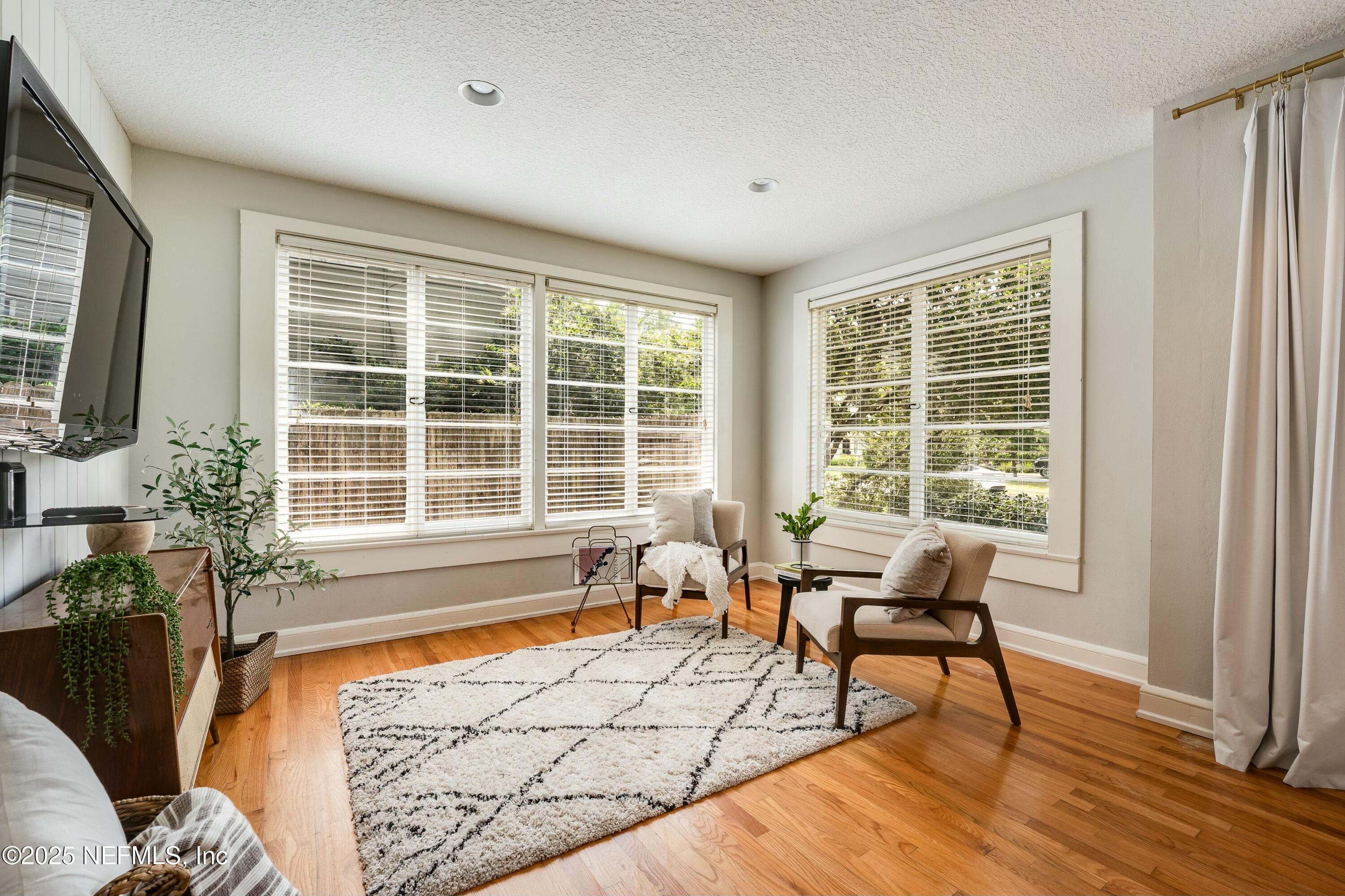1235 Morvenwood Road Jacksonville, FL 32207 - Photo 11 of 55 a living room with furniture and a window