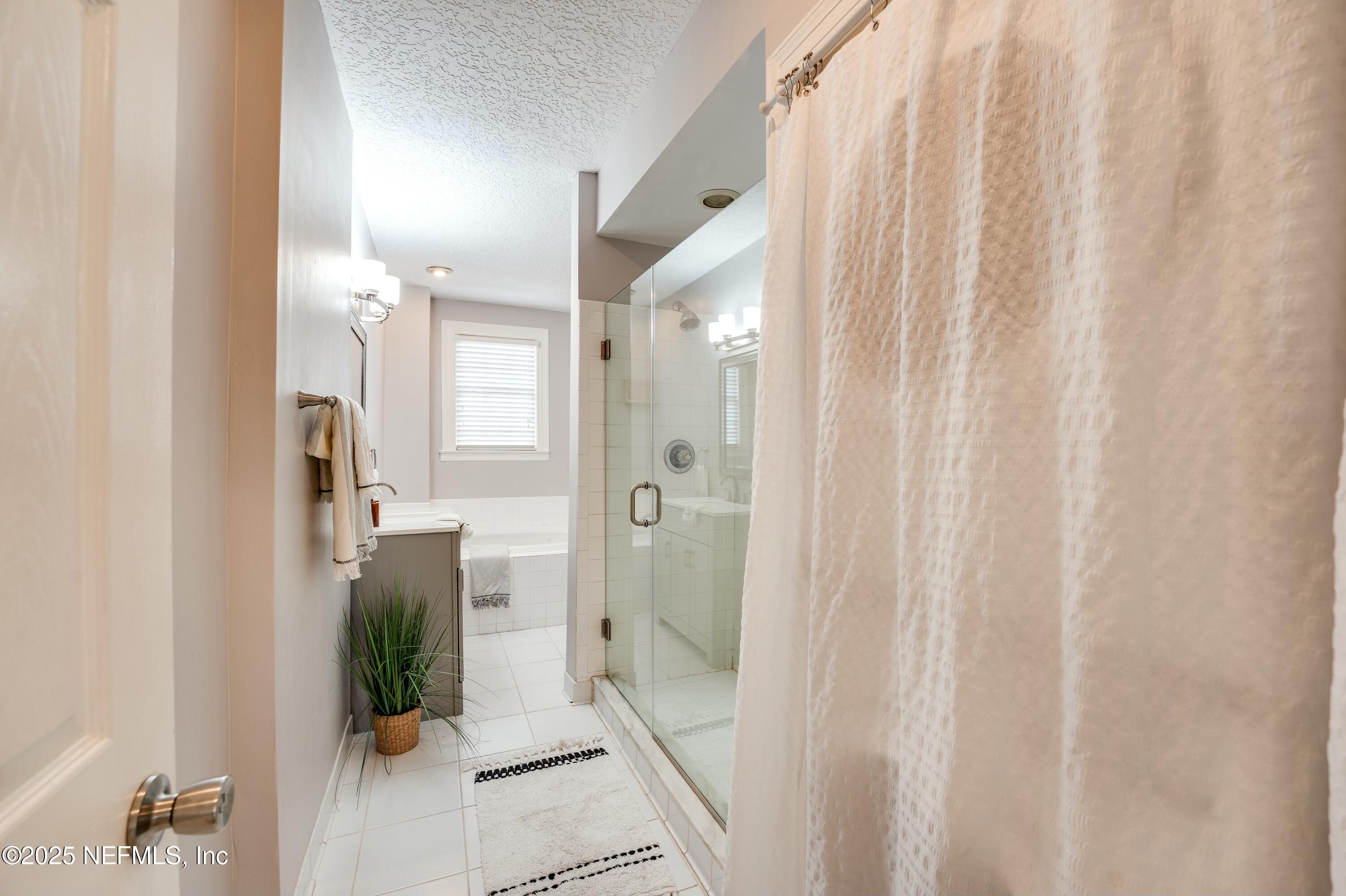 1235 Morvenwood Road Jacksonville, FL 32207 - Photo 31 of 55 a bathroom with a shower