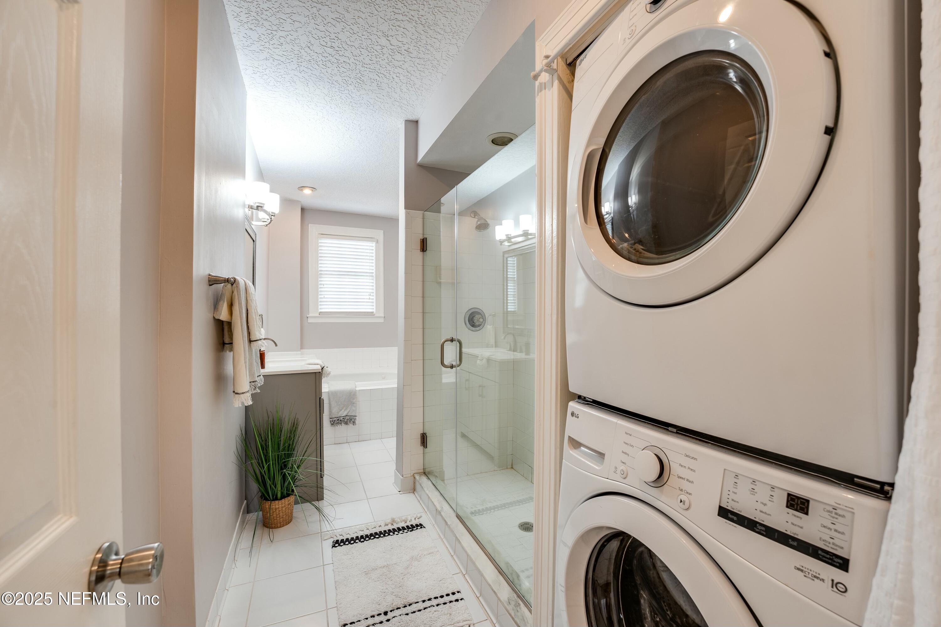 1235 Morvenwood Road Jacksonville, FL 32207 - Photo 32 of 55 a view of a hallway with washer and dryer