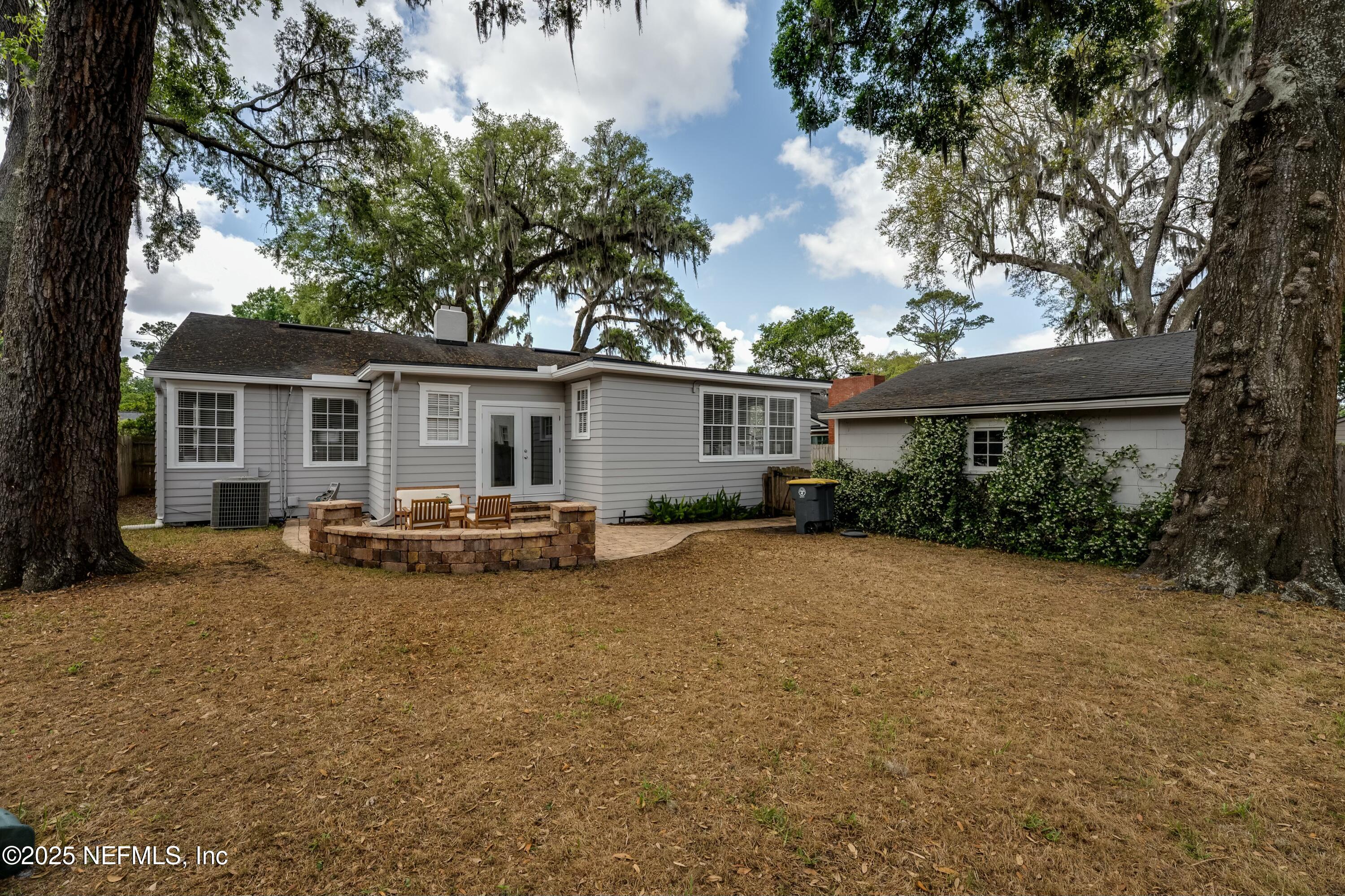 1235 Morvenwood Road Jacksonville, FL 32207 - Photo 38 of 55 front view of a house with a patio