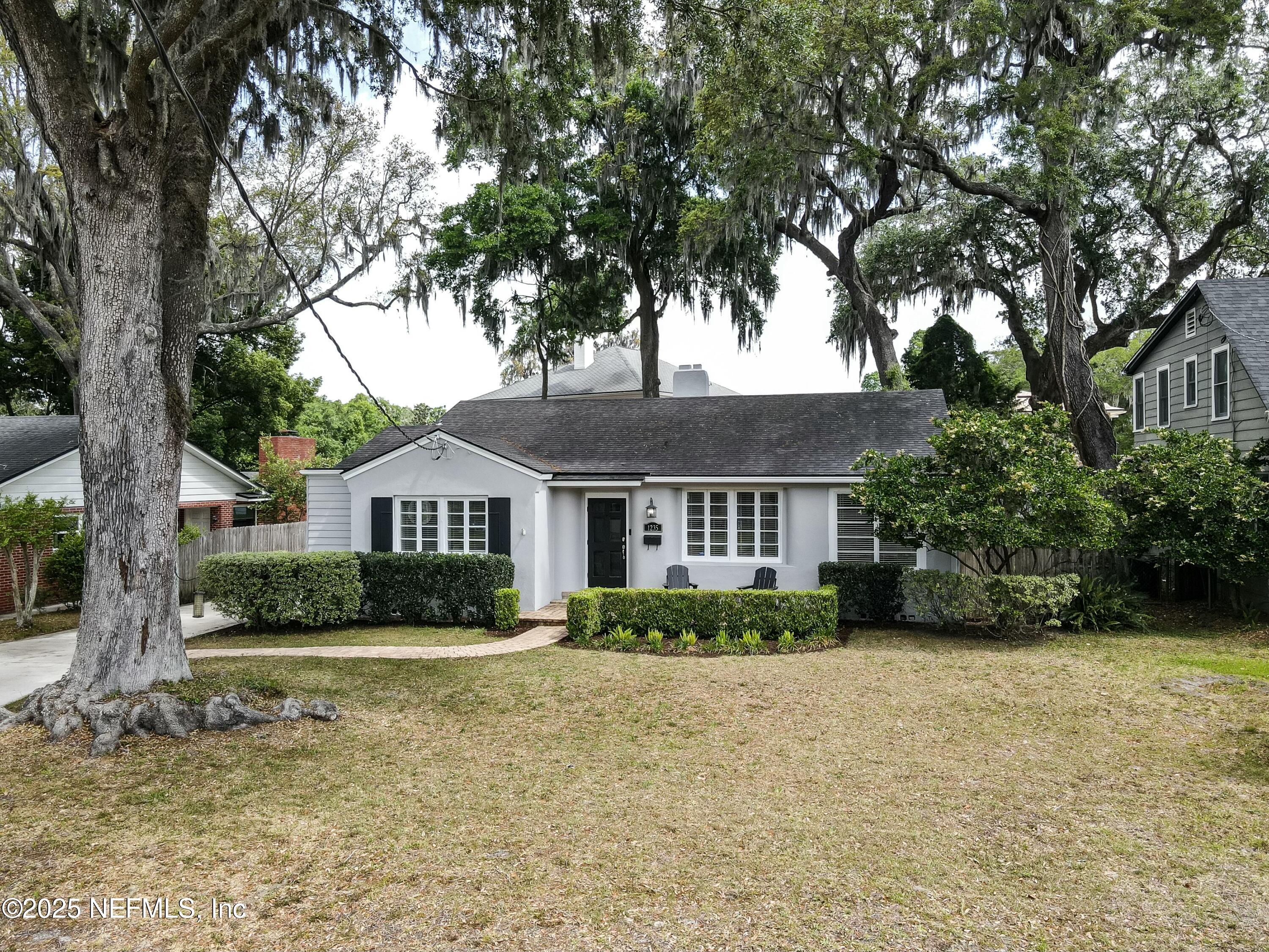 1235 Morvenwood Road Jacksonville, FL 32207 - Photo 41 of 55 front view of a house with a yard
