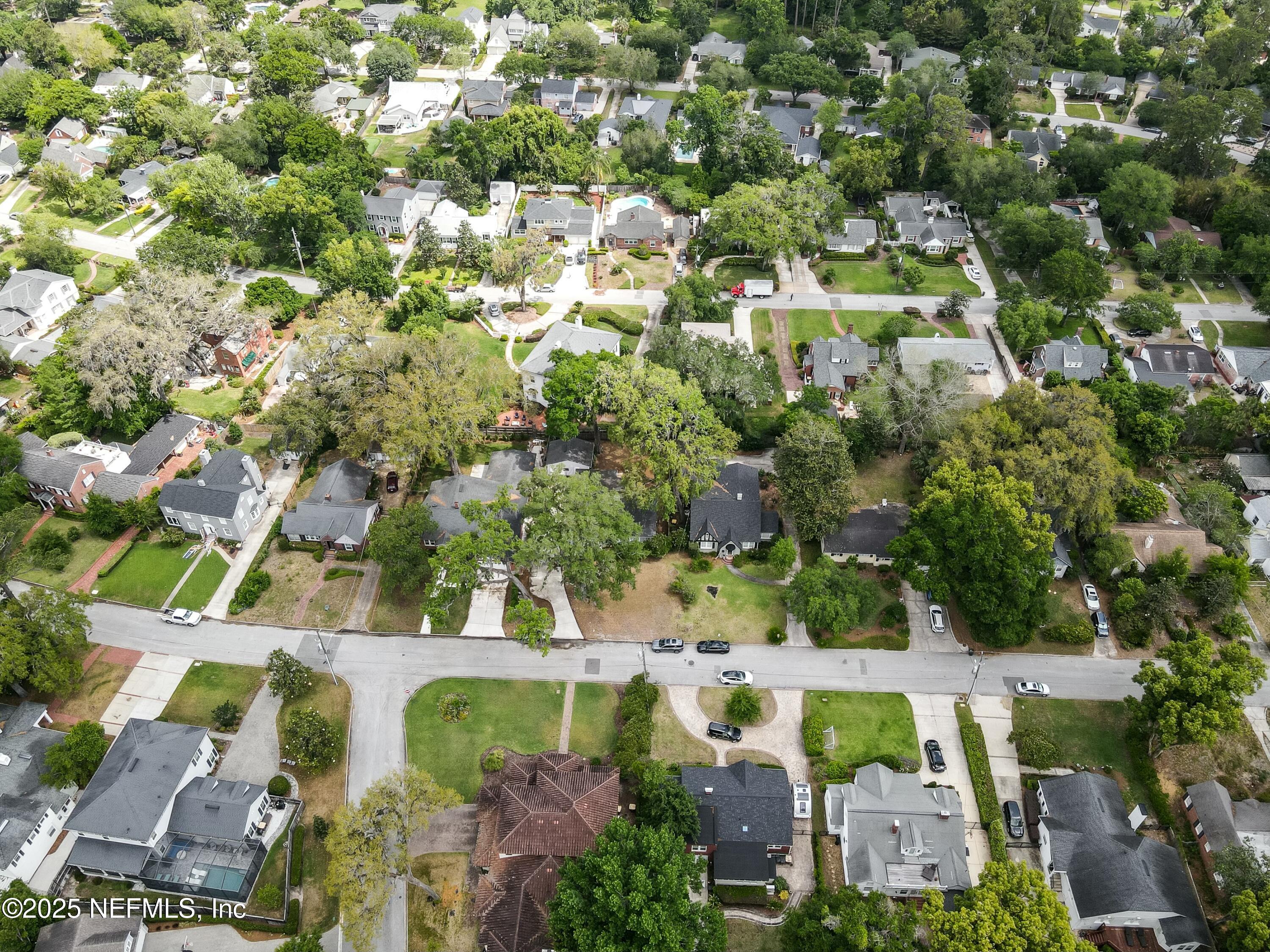 1235 Morvenwood Road Jacksonville, FL 32207 - Photo 45 of 55 an aerial view of residential houses with outdoor space and trees