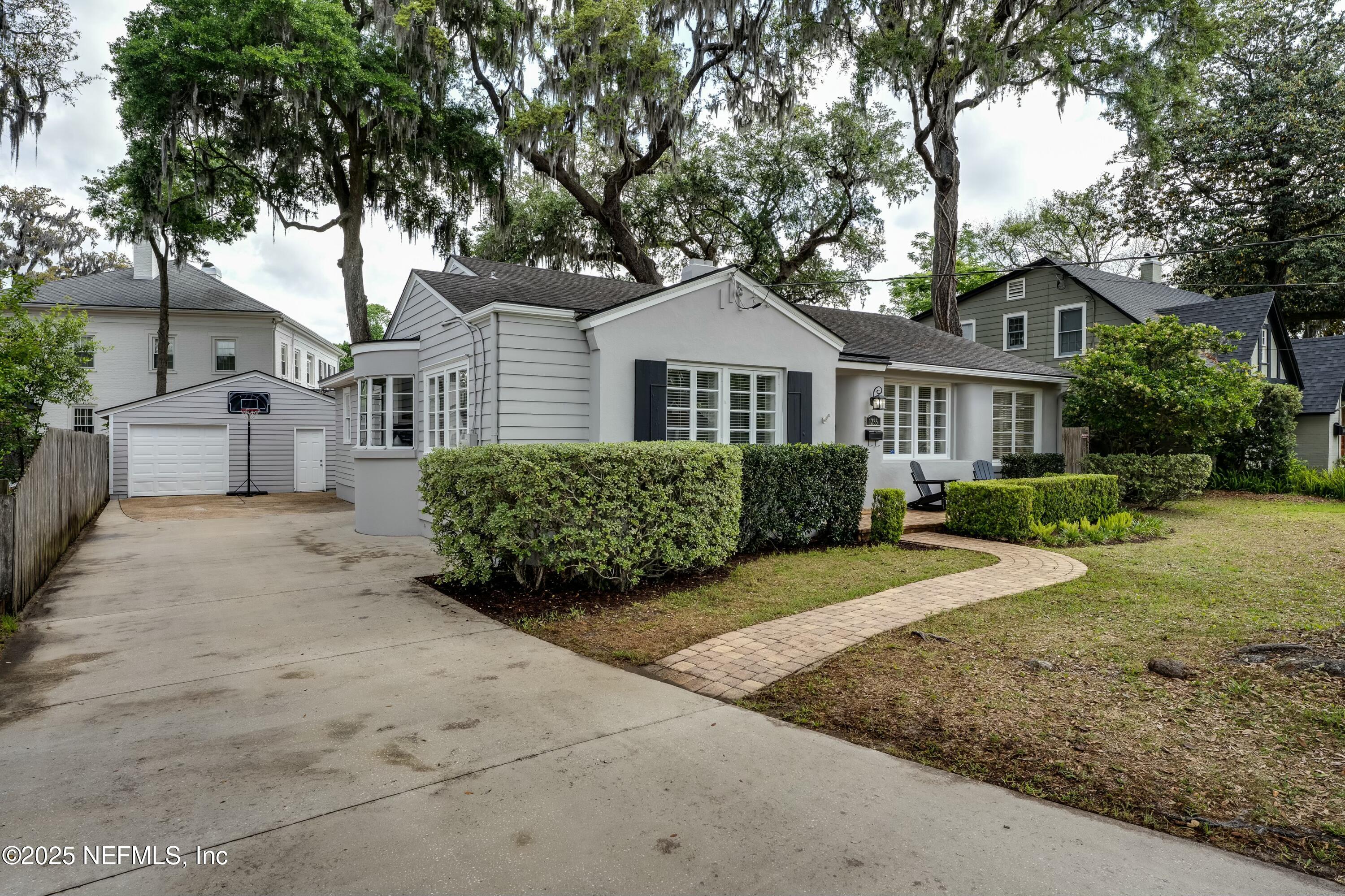 1235 Morvenwood Road Jacksonville, FL 32207 - Photo 6 of 55 a view of a front of house with a yard
