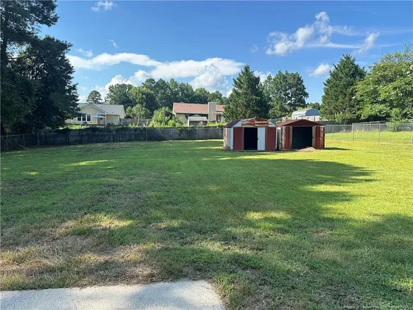a house view with a garden space