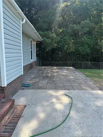 a view of a backyard of a house