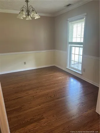 a kitchen with stainless steel appliances granite countertop a stove microwave and refrigerator