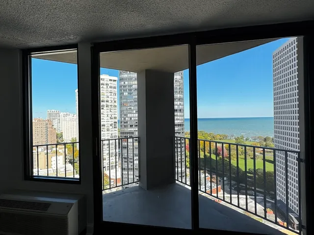 a view of an empty room with a window