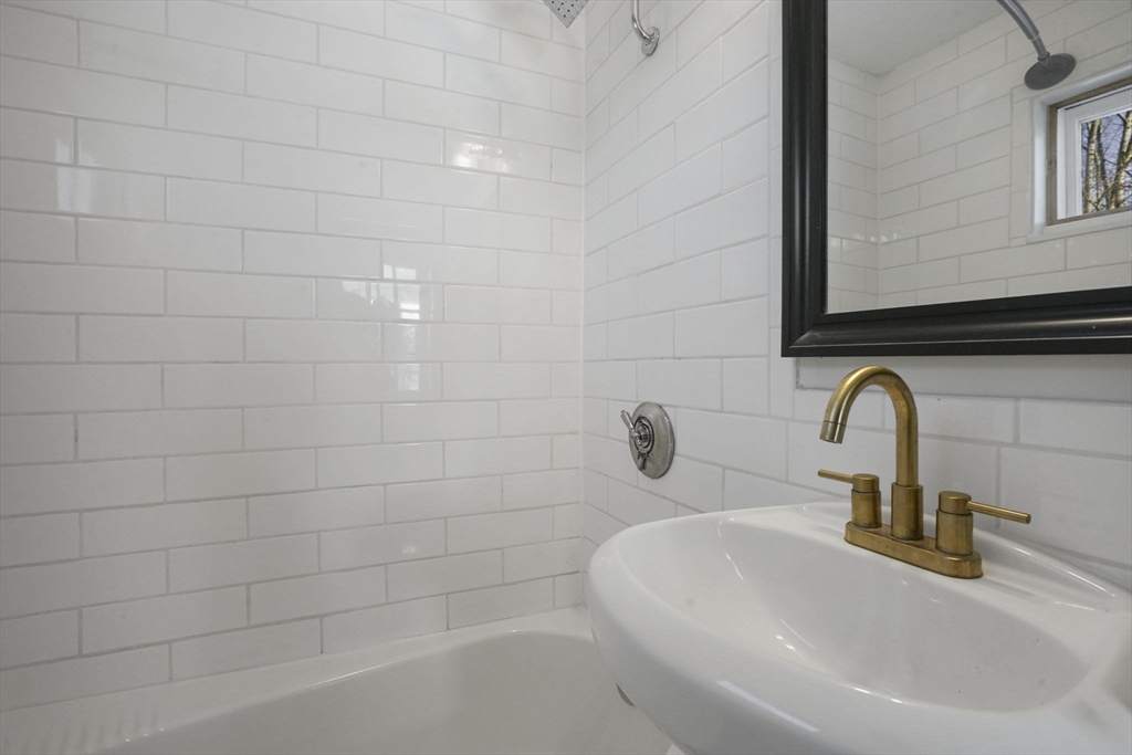 12 Stebbins Street Chicopee, MA 01020 - Photo 23 of 39 a bathroom with a sink