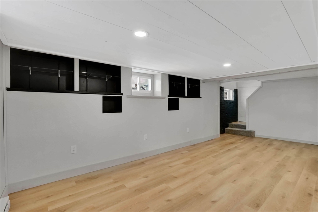 12 Stebbins Street Chicopee, MA 01020 - Photo 28 of 39 a view of empty room with wooden floor