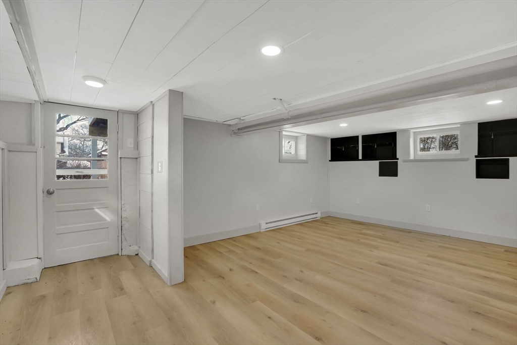 12 Stebbins Street Chicopee, MA 01020 - Photo 29 of 39 a view of a livingroom with an empty space