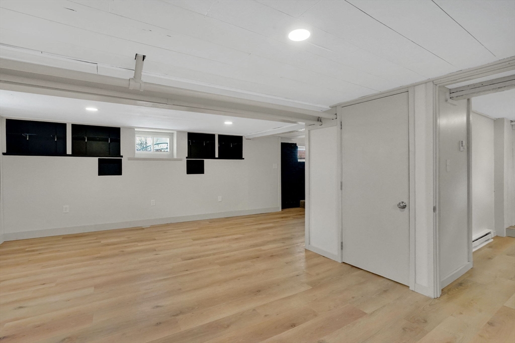 12 Stebbins Street Chicopee, MA 01020 - Photo 30 of 39 a view of a livingroom with an empty space