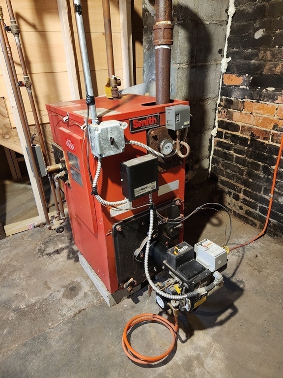 12 Stebbins Street Chicopee, MA 01020 - Photo 32 of 39 a room with gym equipment