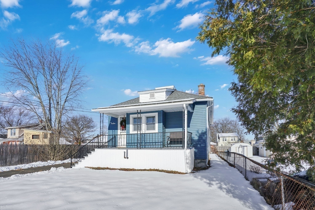 12 Stebbins Street Chicopee, MA 01020 - Photo 35 of 39 a view of a house with a yard