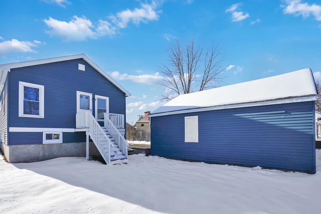 12 Stebbins Street Chicopee, MA 01020 - Photo 36 of 39 a front view of a house with a garage