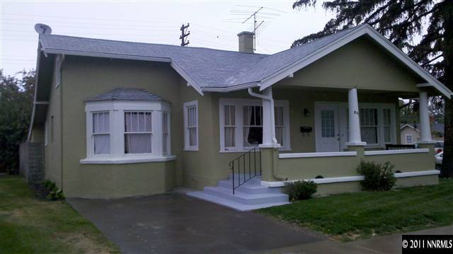 201 Caliente Street Reno, NV 89509 - Photo 3 of 5 a front view of a house with a yard