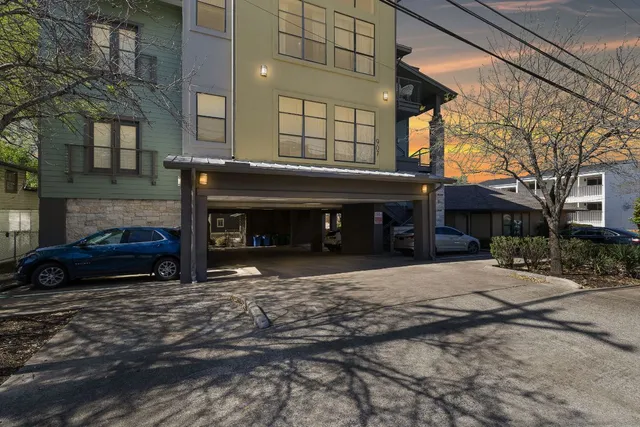 a view of a car park in front of building