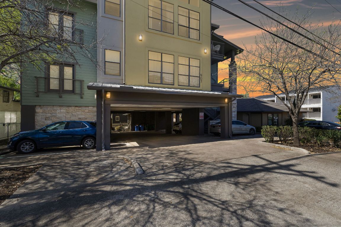 a view of a car park in front of building