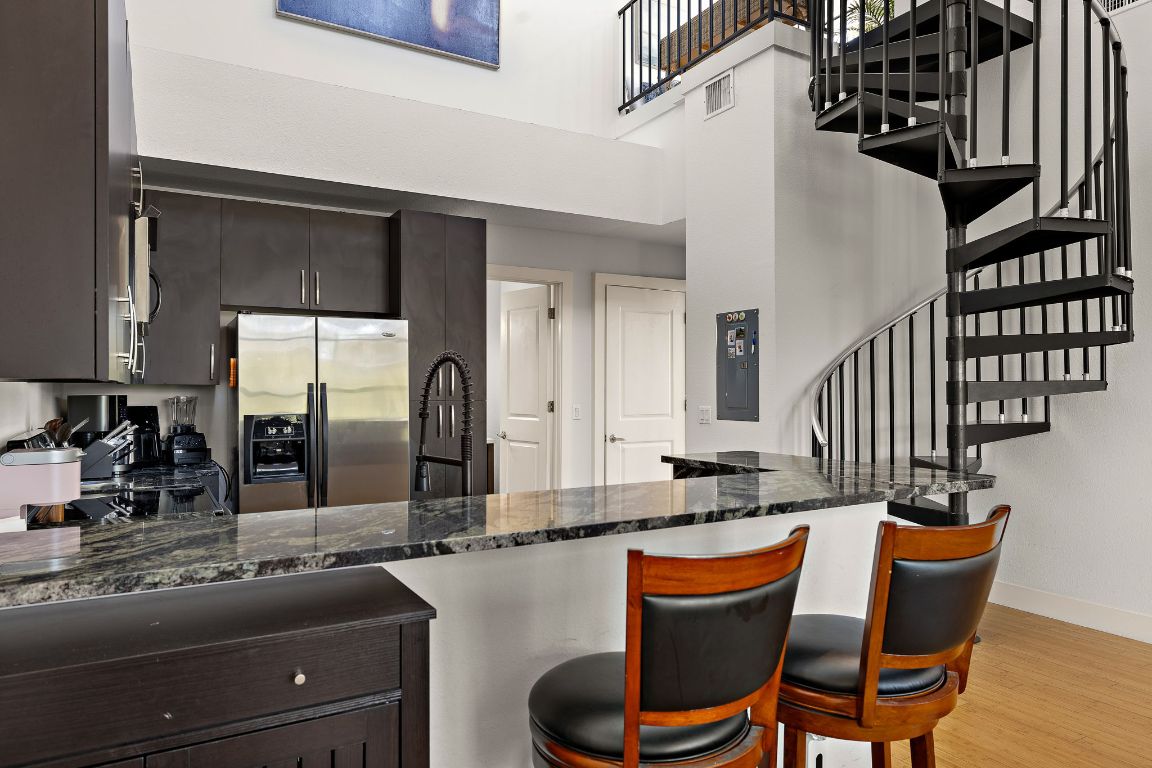 907 Duncan Lane, Unit 302 Austin, TX 78705 - Photo 9 of 24 a outdoor space with patio furniture