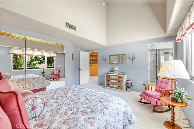 a view of a house with pool table and chairs