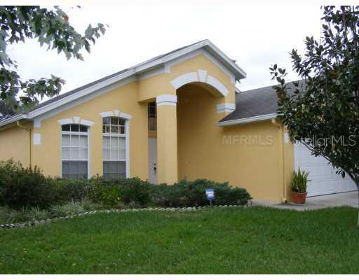 2718 Rivers End Road Orlando, FL 32817 - Photo 1 of 1 a front view of a house with a garden