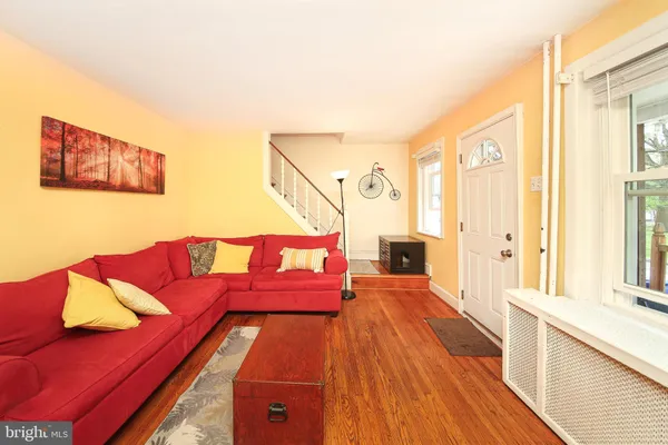 a living room with a couch and a table