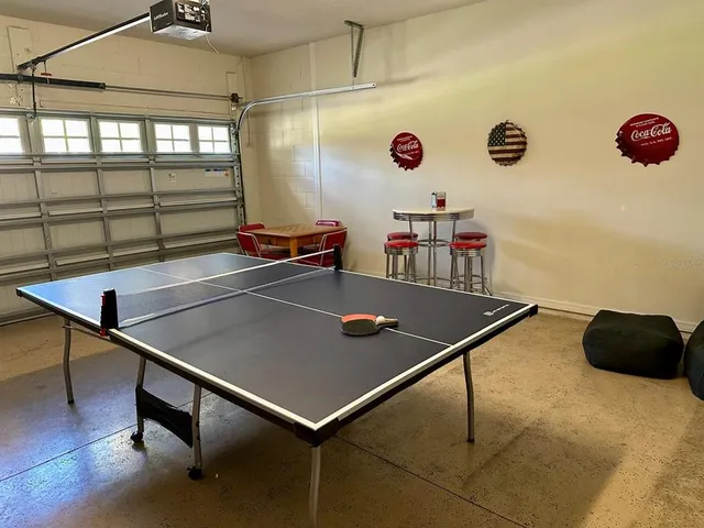 a room with gym equipment and a window