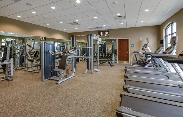 a view of a room with gym equipment